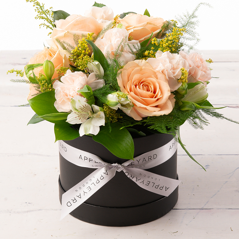 Seasonal pastel Hatbox | Designed by Luxury Florist | Hatbox Flowers | Red Rose Hatbox | Next Day Flower Delivery UK Appleyard London